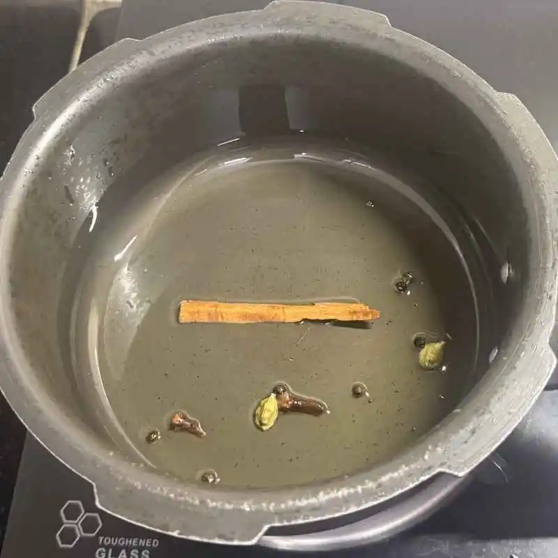 Heat the Oil and Bloom the Whole Spices healthy mutton curry 